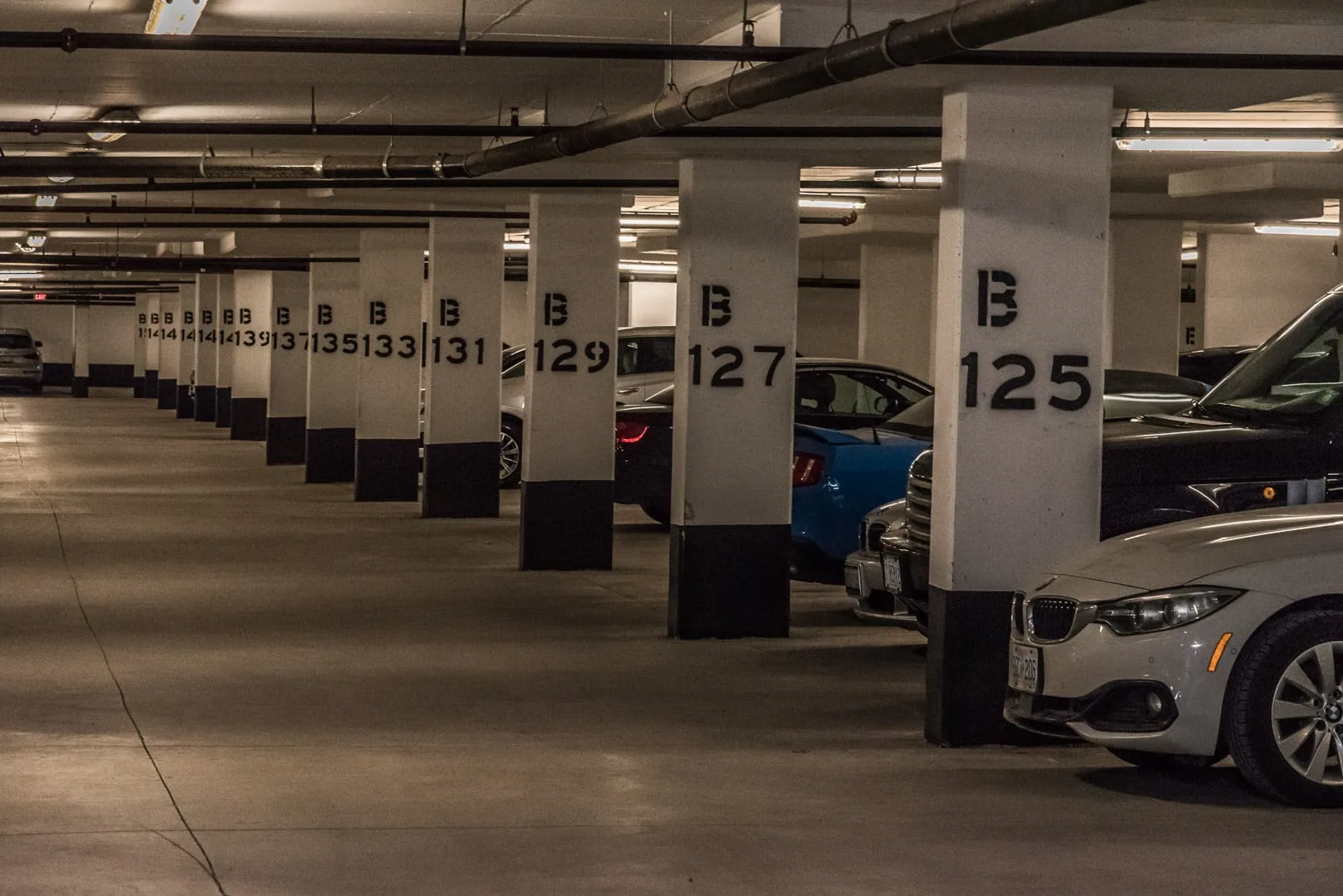 Underground condominium parking garage lit with new LED fixtures